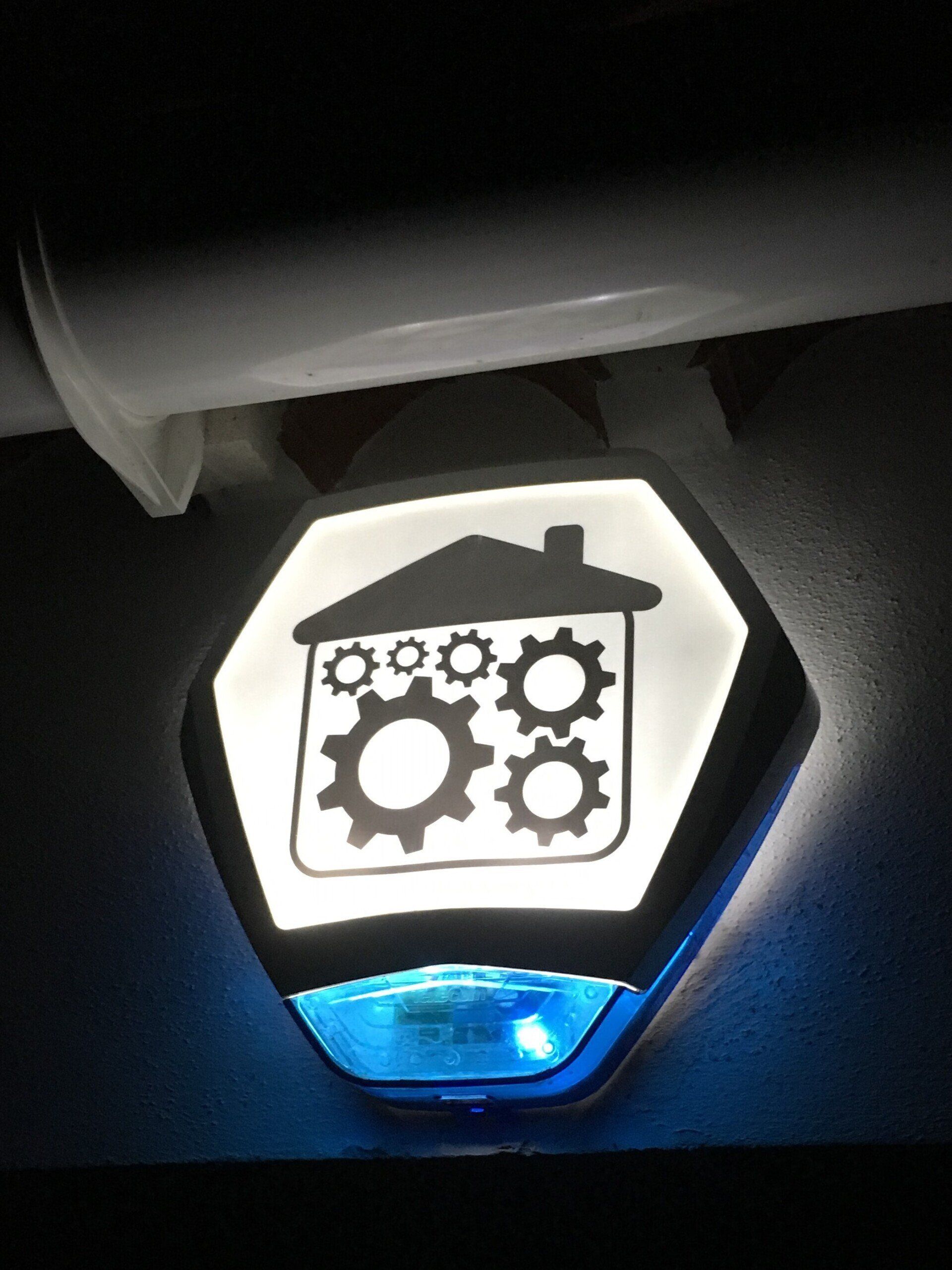 Intruder alarm sound bell with Automated Spaces logo illuminated inside the housing