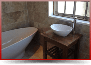 For bathroom installation in Kilwinning call T Reid & Son Bathroom design