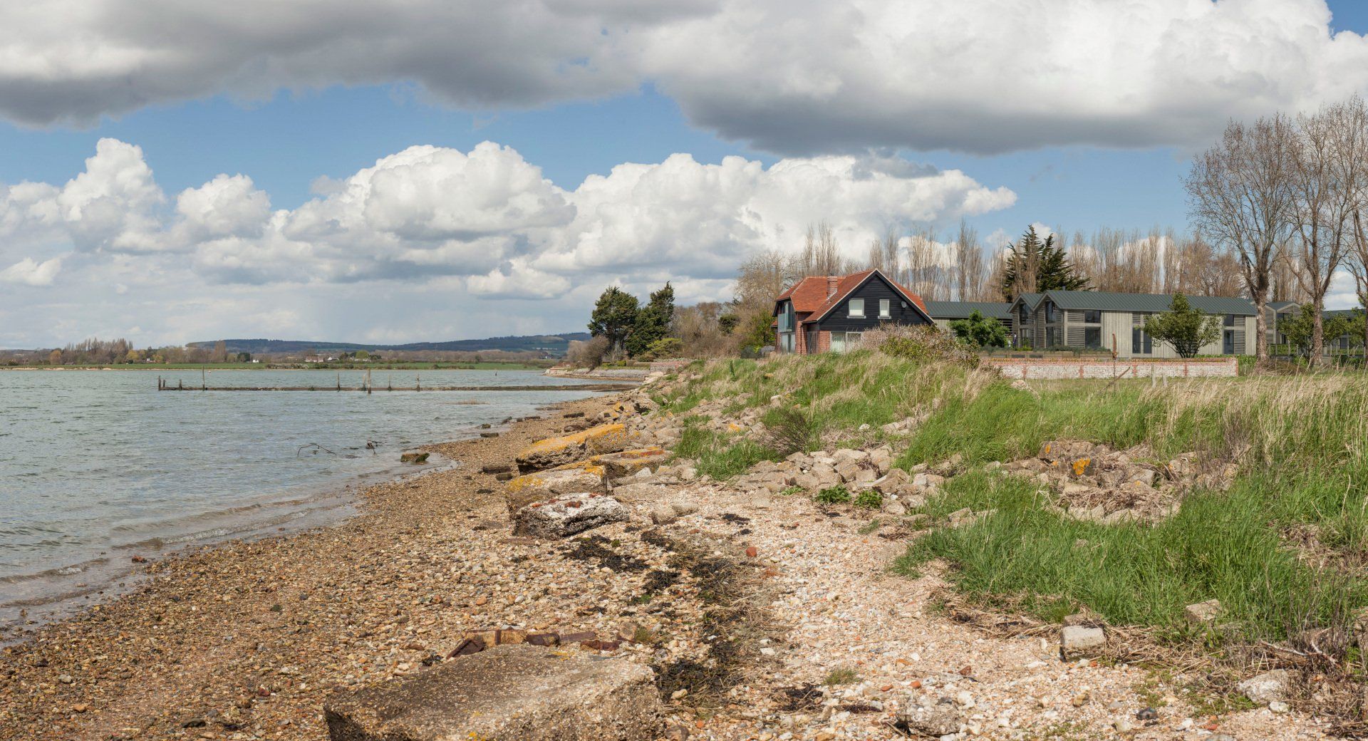 Bosham waterfront houses to replace derelict industrial buildings designed by LSH Architects