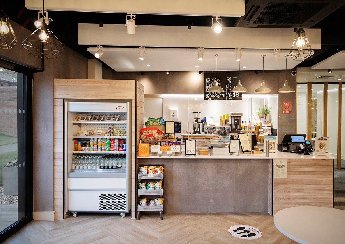 F&B counter at The Exchange, a refreshment hub with flexible workspace for Chineham Park by LSH Architects