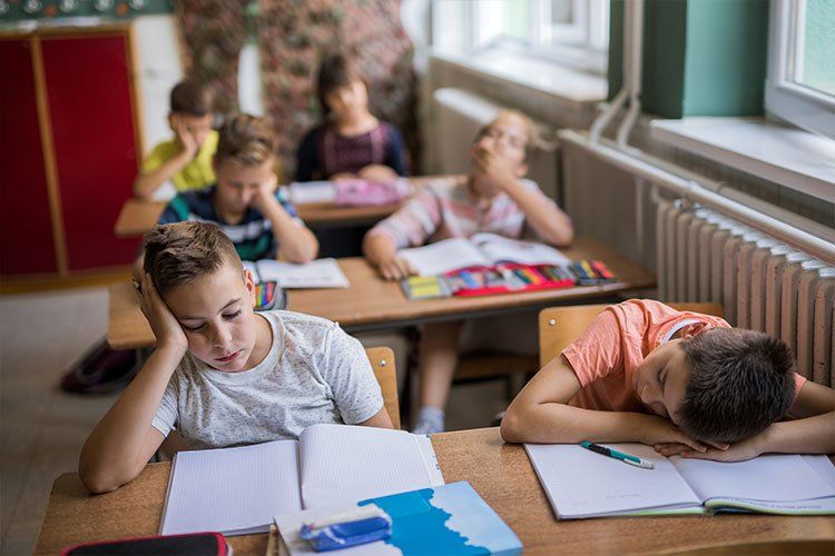 Young children sleeping in class