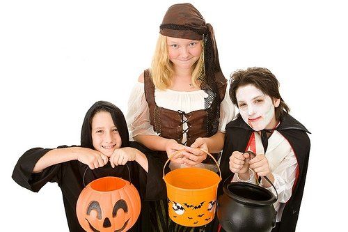 3 kids in costumes
