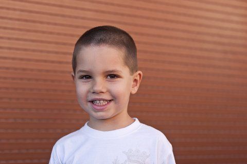 little boy smiling