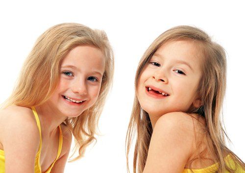 two girls smiling
