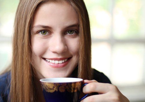 young woman drinking tea
