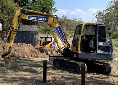 Yellow Excavator — Landscaping Supplies in Gladstone, QLD Yellow Excavator — Landscaping Supplies in Gladstone, QLD