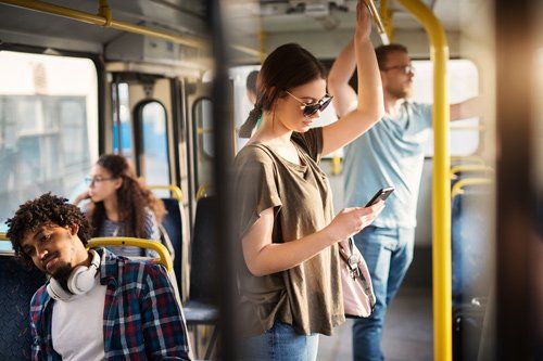 Woman Standing On The Bus — Placentia, CA — Law Offices of Kennith L. Peterson
