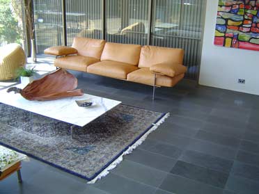 living space with dark flooring