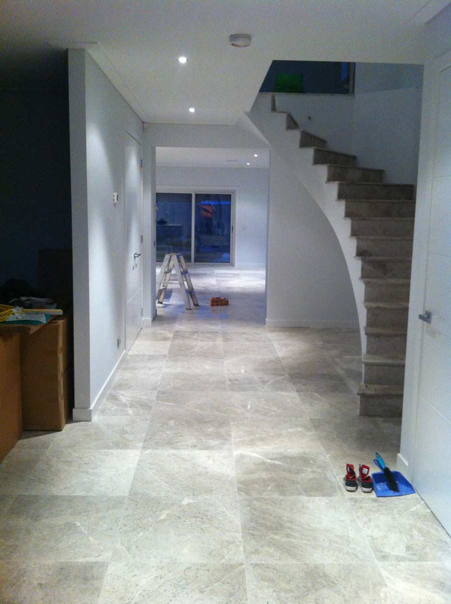 view of tiling with stairs