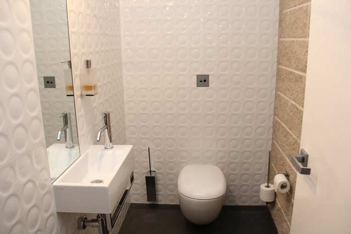 bathroom white textured tile