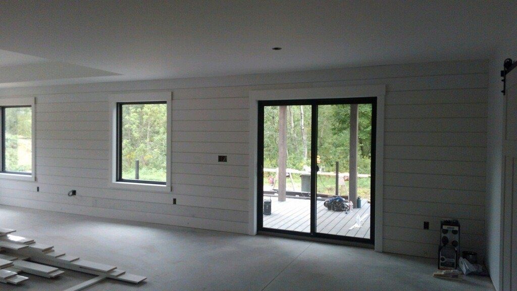 An empty room with a sliding glass door