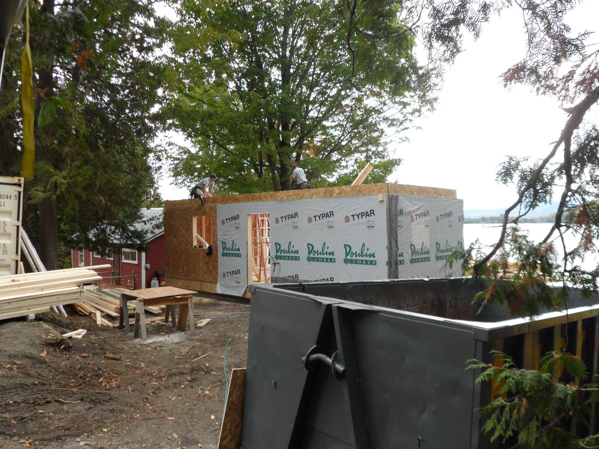 A construction site with a container that says ' pacific ' on it
