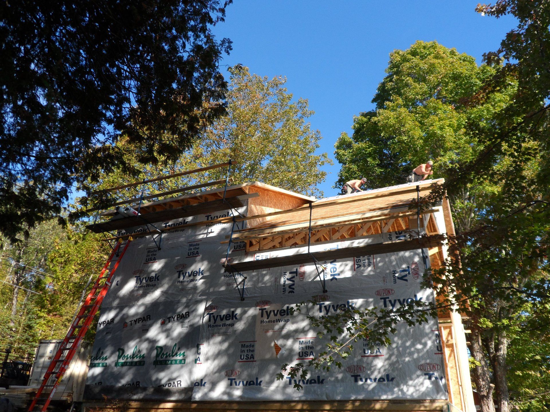 A roof is being built on a house