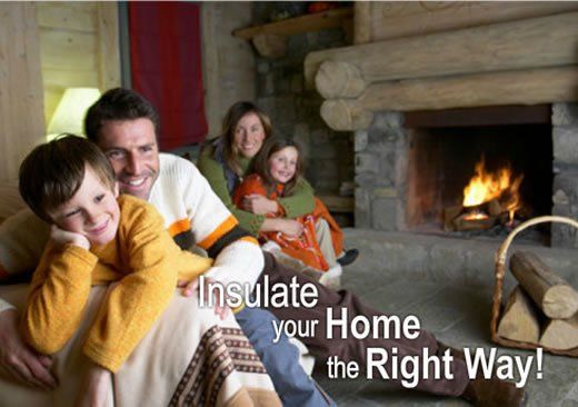 A family sitting by the fire in their house