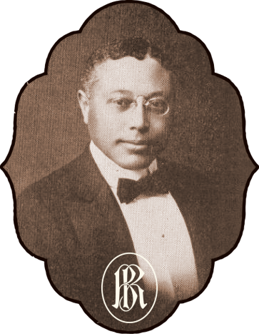 Sepia portrait of a man in a suit and bow tie, framed in an ornate oval border.