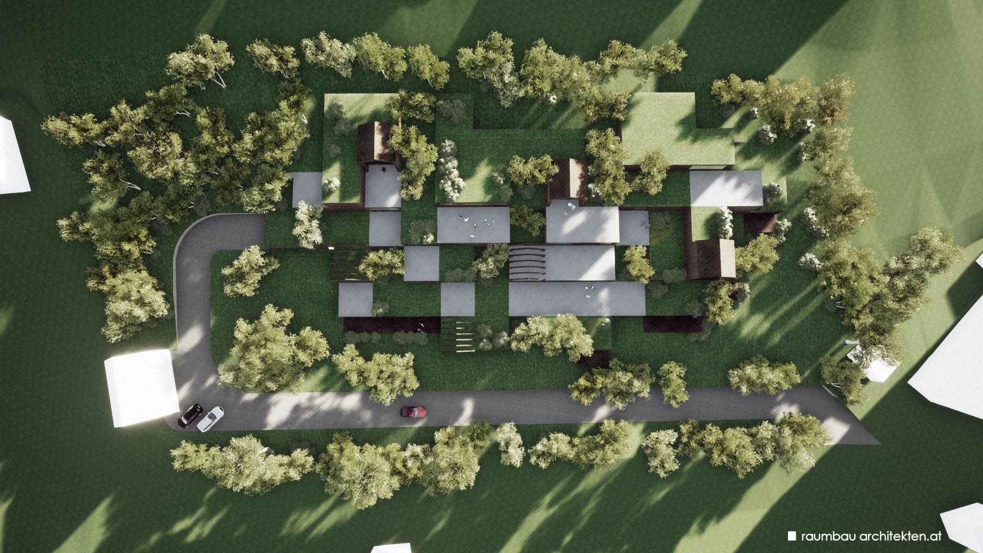 Eine Luftaufnahme eines Hauses, umgeben von Bäumen und Gras