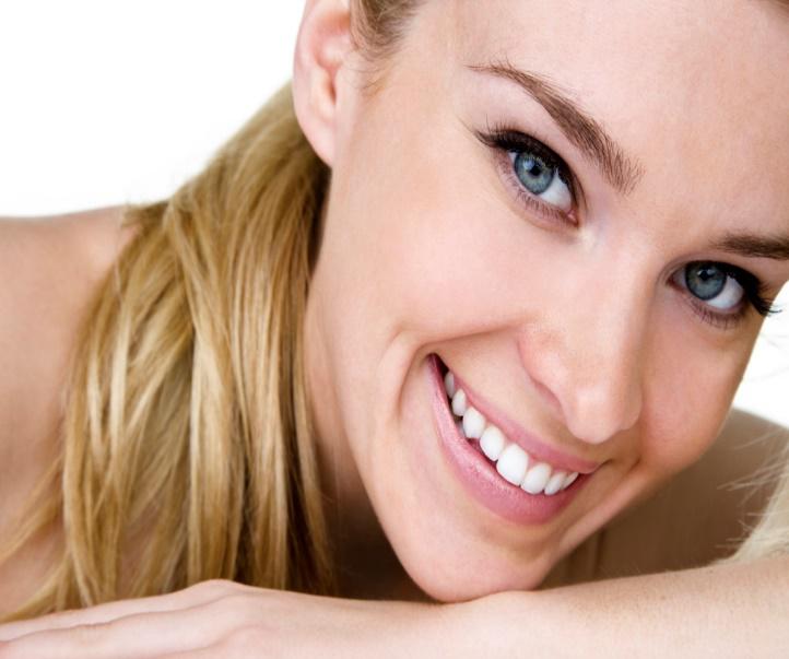 view of a smiling woman with white teeth