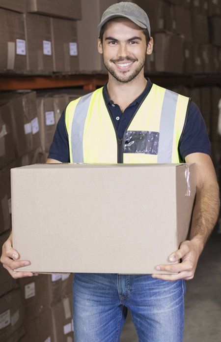 man carrying a box bay removals man carrying a box