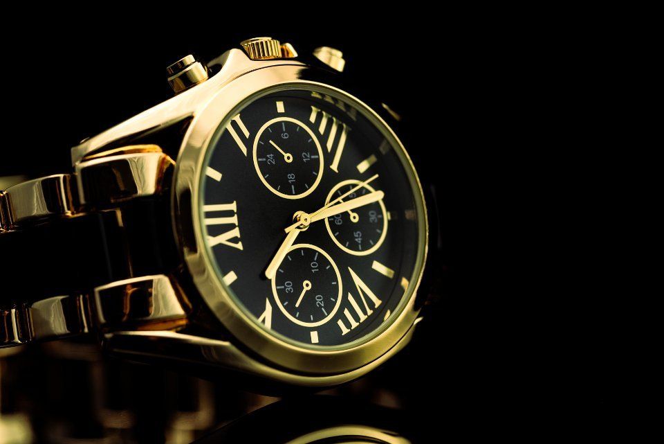 Orologio con cronometro e numeri romani