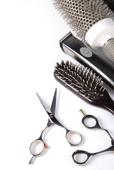 Attrezzi per regolare barba e capelli