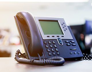 Telephone Devices at Office Desk — Lancaster, CA — Bear Communications Telephone Devices at Office Desk — Lancaster, CA — Bear Communications