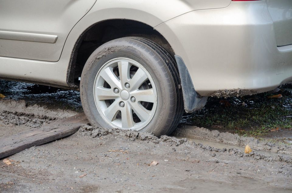 Car Stuck in Mud Car Stuck in Mud