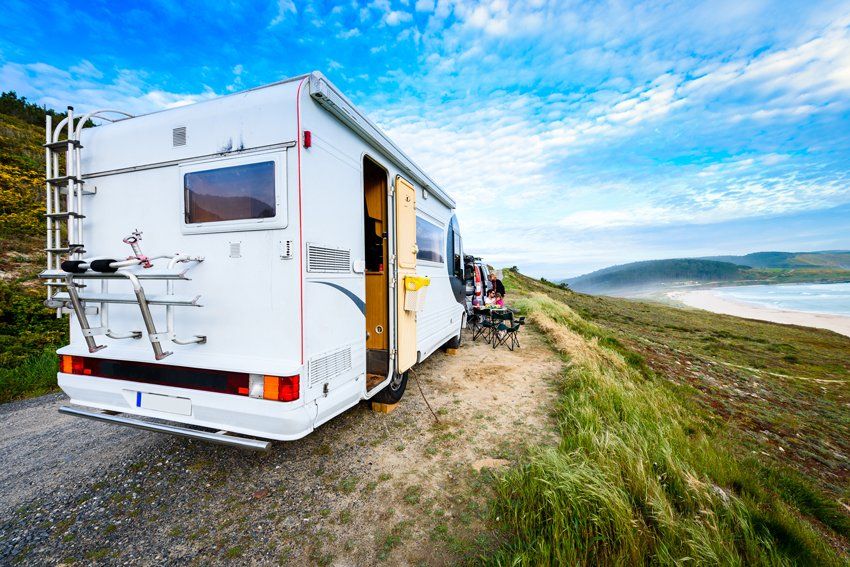 Motorhome Rv And Campervan Parked On A Beach — Haltom City, TX — AA Wrecker Service Motorhome Rv And Campervan Parked On A Beach — Haltom City, TX — AA Wrecker Service