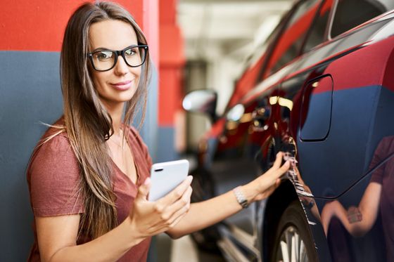 Girl Calling Car Service Repair — Columbus, OH — Collision Solutions LLC Girl Calling Car Service Repair — Columbus, OH — Collision Solutions LLC