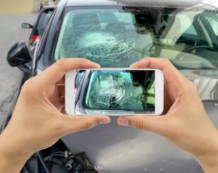 Taking Photo Windshield Cracked — Columbus, OH — Collision Solutions LLC Taking Photo Windshield Cracked — Columbus, OH — Collision Solutions LLC