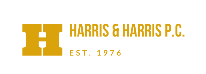 Harris & Harris P.C. logo in gold with “EST. 1976” on white background