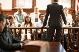Attorney Speaking to Jury — Adoption, Family, and Real Estate Law in Poughkeepsie, New York Attorney Speaking to Jury — Adoption, Family, and Real Estate Law in Poughkeepsie, New York