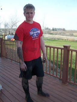 Kimberlee's oldest son standing on their deck