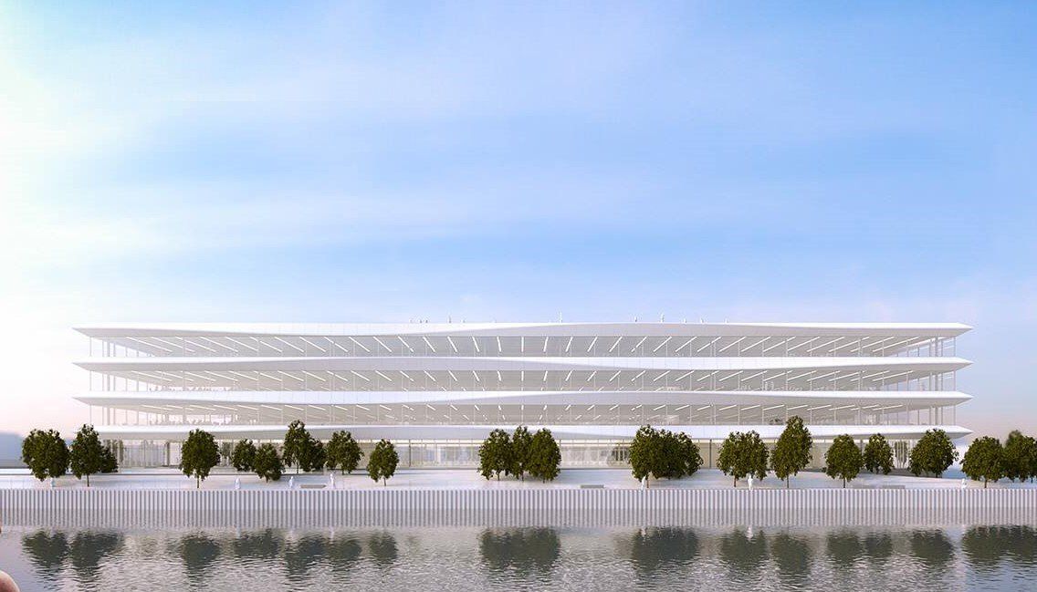 An artist 's impression of a large white building next to a body of water.