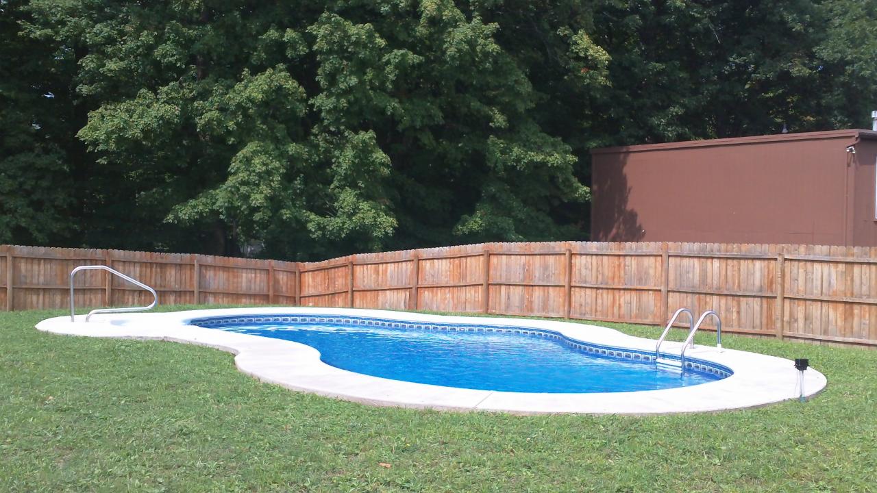Large Pool With Wooden Wall — Liverpool, NY — CoolWaters Pool & Spa