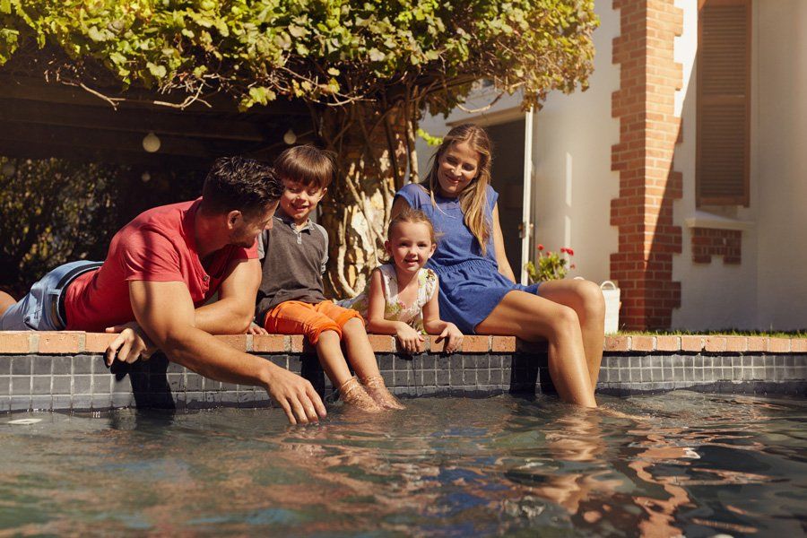 Family On The Pool Side — Liverpool, NY — CoolWaters Pool & Spa