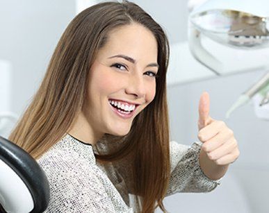 Teeth Dentistry — Woman Enjoying Dental Exams in Redding, CA Teeth Dentistry — Woman Enjoying Dental Exams in Redding, CA