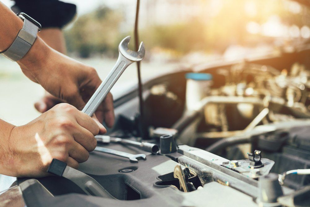Repairing Car with Wrench — Rockwall, TX — Rockwall Auto Repair