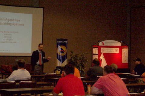 A man is giving a presentation to a group of people