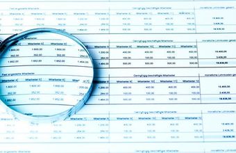 magnifying glass on paper
