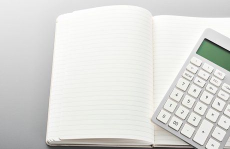 calculator on blank notebook