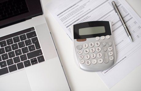 calculator by laptop