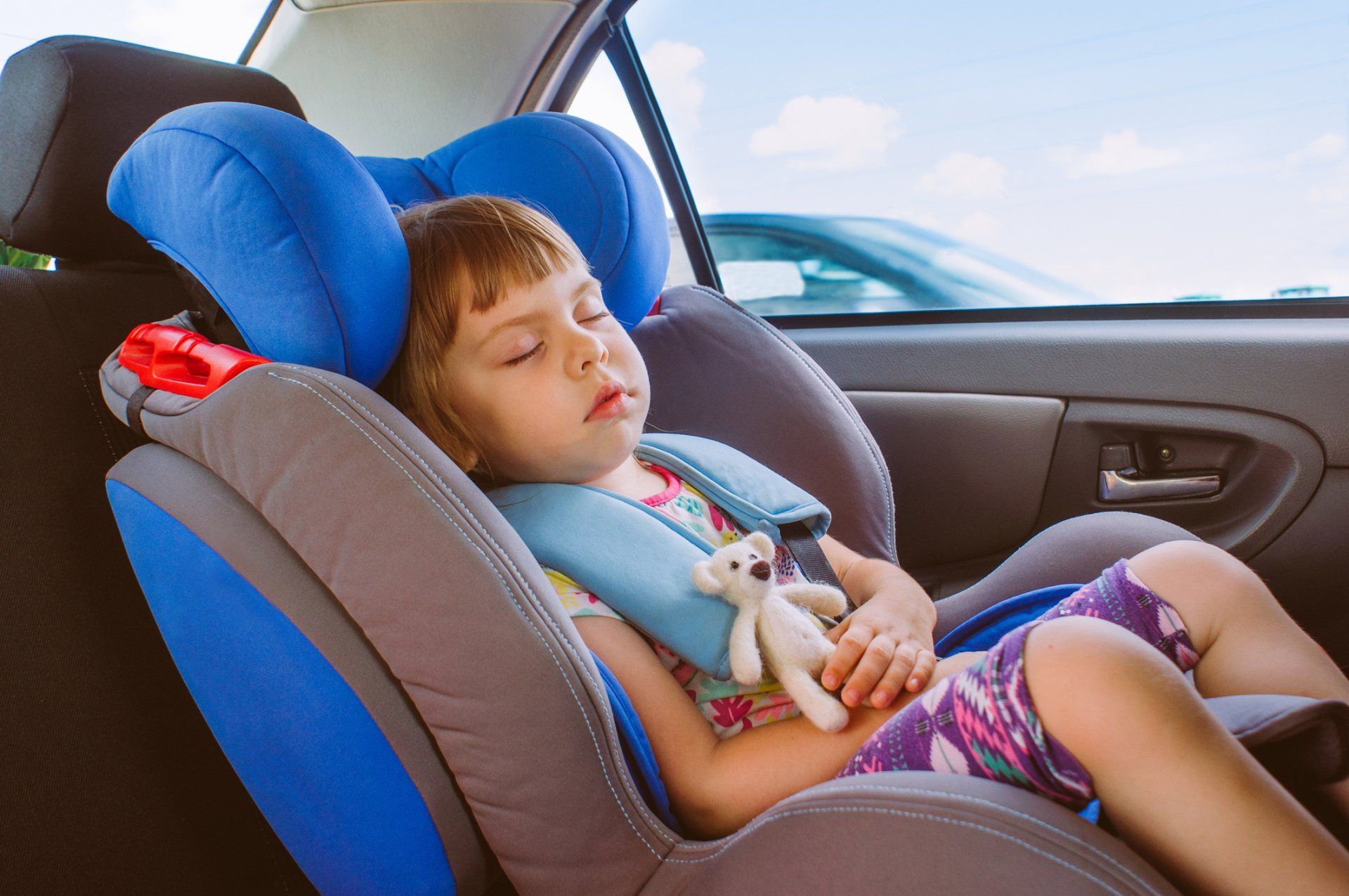 Toddler Little Girl Sleeping In The Car Seat — Denver, CO — Mr. Sids Fine Auto Upholstery