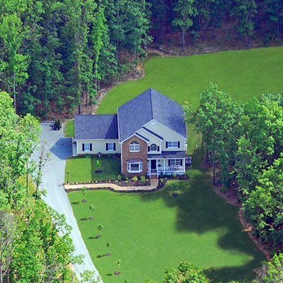 Big house in a green field — building remodeling & repair contractors in Chartlottesville, VA Big house in a green field — building remodeling & repair contractors in Chartlottesville, VA