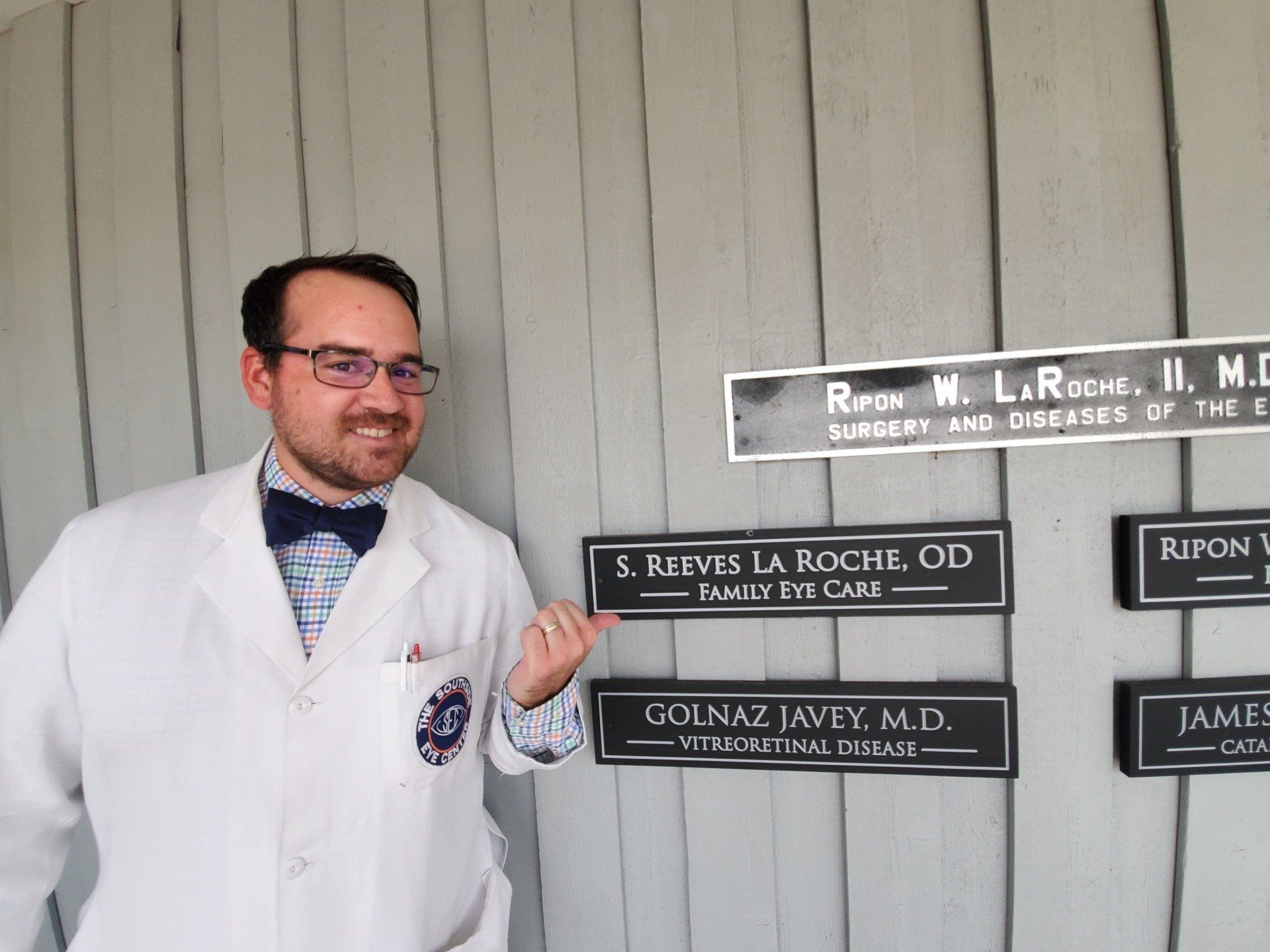 Dr. La Roche with the Name Signs – Farmville, VA – Southside Optical Center Dr. La Roche with the Name Signs – Farmville, VA – Southside Optical Center