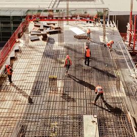 Roofers Working on Commercial Building — Colorado Springs, CO — McWilliams Roofing