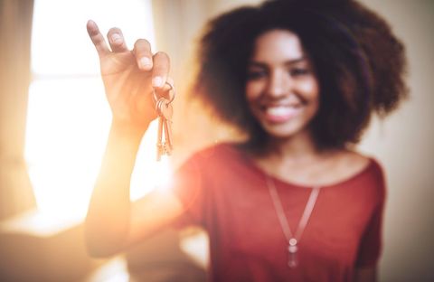 Happy Woman with Keys