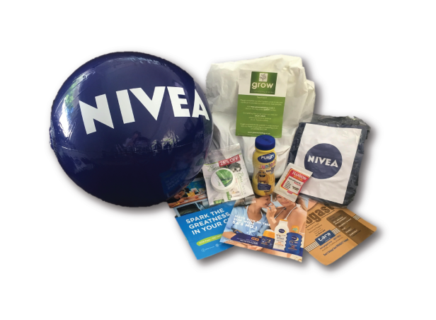 Nivea promotional items: blue inflatable ball, brochures, samples, and a Grow reusable bag.