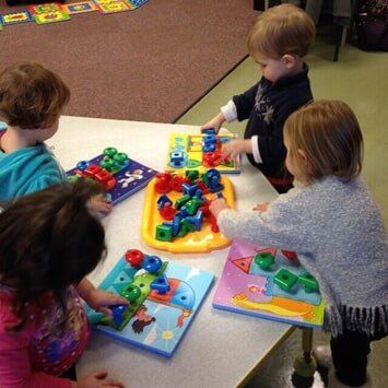 Children Playing Their Toys - School Care in Mount Laurel, NJ Children Playing Their Toys - School Care in Mount Laurel, NJ