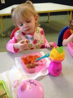 Girl eating her lunch - School Care in Mount Laurel, NJ Girl eating her lunch - School Care in Mount Laurel, NJ