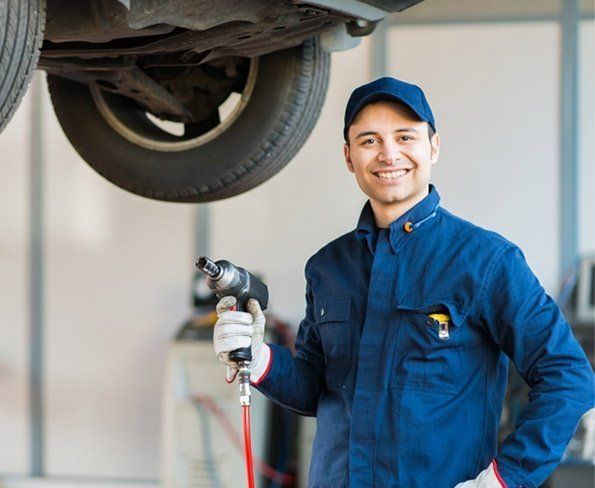 man-smiling-while-holding-equipment